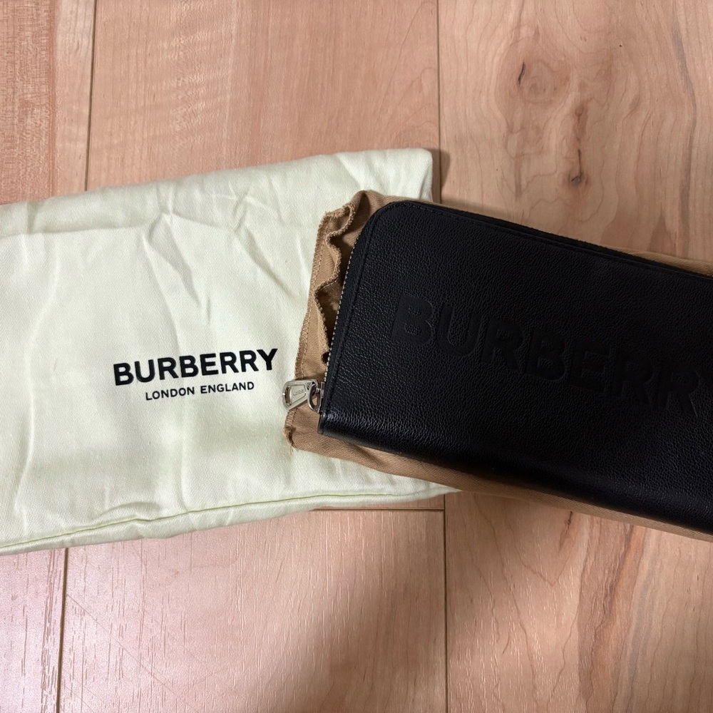 Authentic Burberry zippered wallet in black